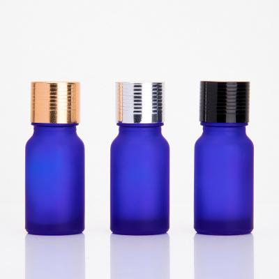 China Personal Care 10ml Portability Elite Liquid Bottle Essential Oil Bottles Glass Blue Bottle With Gold Lid for sale