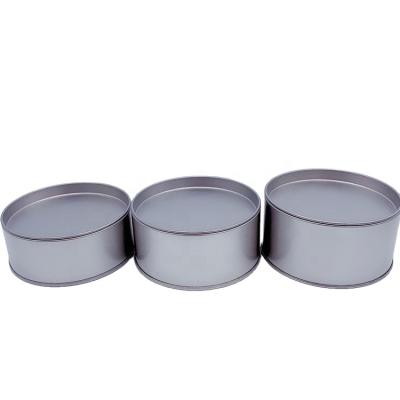 China Custom Storage Round Black Tin Box Metal Tins And Boxes With Concave Cover Design for sale