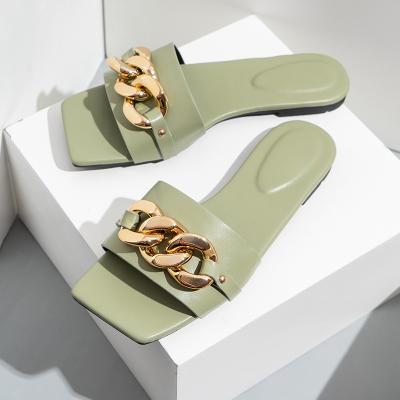 China Fashion trend summer casual sandals out for women shoes flat metal PU flat slippers wholesale slippers for ladies for sale