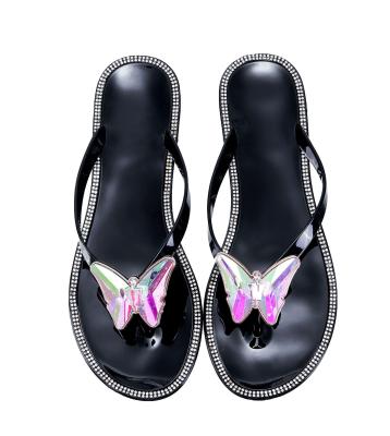 China Quick-drying 2021 summer charm women's shoes colorful new flip-flop flat diamond rhinestone bow flat slippers for sale