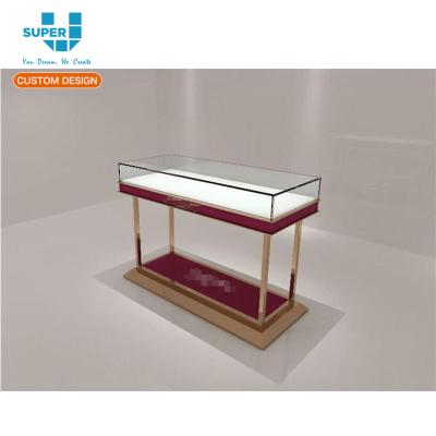 China Fashion Manufacturer Guangzhou Lockable High End Floor Glass Rack Gold Plating Steel Led Light Jewelry Display Cabinets for sale