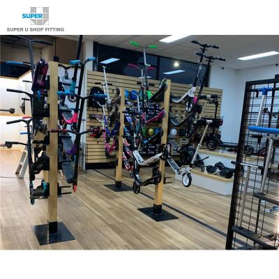 China Fashion Custom E-Bikes Shop Furniture Design Retail Store Commercial Free Standing Wooden Electric Scooter Display Stand for sale