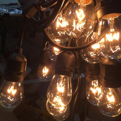 China Hot Selling S14 Tungsten String Lights Vintage Wedding Lights Party Decoration LED Bulb S14 Globe Glass Tungsten String Lights for sale