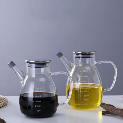 China Portable Glass Olive Oil Dispenser With Handle Pot Seasoner Clear Soy Vinegar Round Kitchen Bottle Viable Glass Wholesale for sale