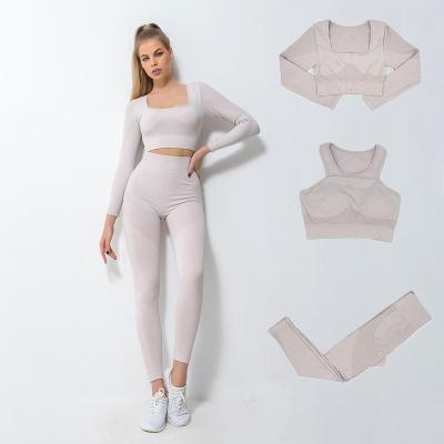 China New Breathable 3pcs Yoga Suit Seamless Yoga Set Tight Fit Sports Long Sleeve Yoga Sets Fitness Women for sale