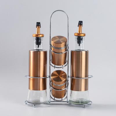 China Viable Kitchen Glass Salt Pepper Jars Spice Jars Seasoning Oil Bottle Iron Glass Sheet Outsourcing Storage Jars With Iron Rack Set for sale