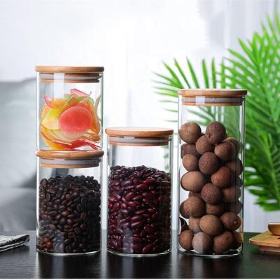 China High Borosilicate Storage Round Airtight Glass Well Sealed Clear Jar With Lid Household Snack Jar Bamboo Tea Sugar Seasonings Jar for sale