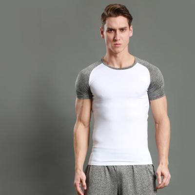 China Quick Dry Anti-Wrinkle Workout Spandex Short Sleeve Workout Fitness Gym Clothing Sports T-shirt Plus Size Man Tops Casual Men's Gym T-shirt solid color for sale