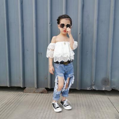 China Breathable Summer Kids Two Piece Dress Off The Shoulder Top And Hole Denim Pants Girls Dress Set for sale