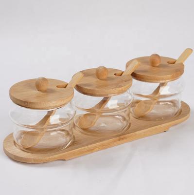 China 3 Pcs Sustainable Spice Jar Set Storage Container Bamboo Food Glass Kitchen Herb Jar for sale