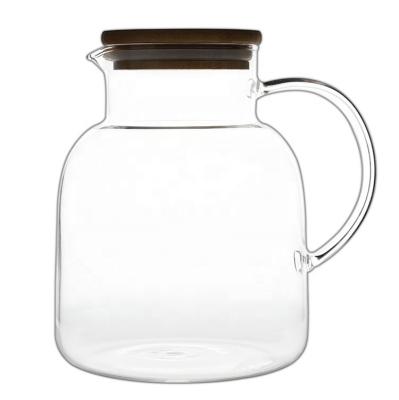 China Sustainable Manual Water Blown Heat Resistant Transparent Glass Jar for sale