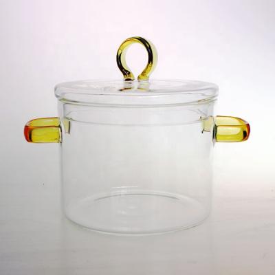 China Sustainable Kitchen Pyrex Glass Soup Cooking Pot With Color Handles for sale