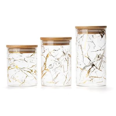 China New Design Sustainable Borosilicate Glass Storage Container Embarble Customized Jar With Bamboo Lids Spice Jars for sale