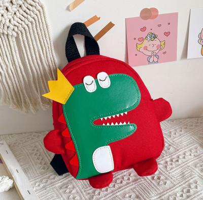 China Load relief 2021 hot sale for kindergarten child backpack dinosaur cartoon pattern bags for sale