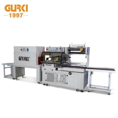 China GURKI Semi Automatic Food Shrink and Seal Packing Machine for sale