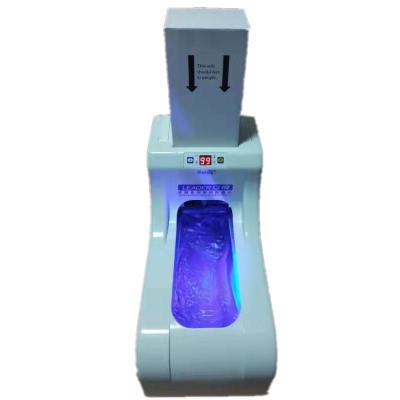 China Stocked Automatic Nonwoven Shoe Film Dispenser Machine For Home Disposable Plastic Shoe Cover for sale