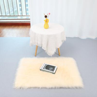 China 2022 Hot Sale Washable Faux Sheepskin Fur Rug And Blanket Modern Home Living Room Floor Carpet Faux Fluffy Fur Blanket Custom Bedroom Area Rug for sale