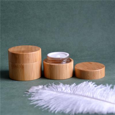 China Cosmetic natural products round 50g 100g cosmetic bamboo cream jar with inner plastic pp for sale