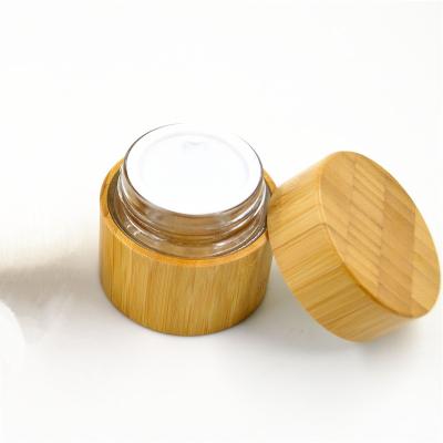 China Cosmetic Containers 100% Recyclable Wooden Bamboo Glass Jar /bottle Cosmetic Packaging for sale