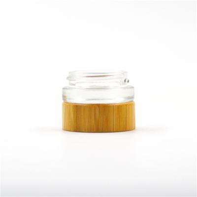 China Hot Selling Personal Care 50ml Eco Friendly Skin Care Cosmetic Glass Cream Jar With Bamboo Lid for sale