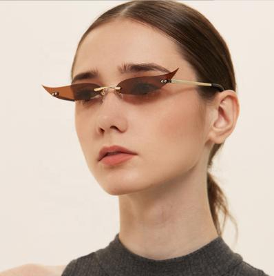 China New Fashion US Warehouse Spot Metal Sunglasses Retro Metal Frame Cat Eye Shade Women Trendy Shipping Rimless Sunglasses for sale