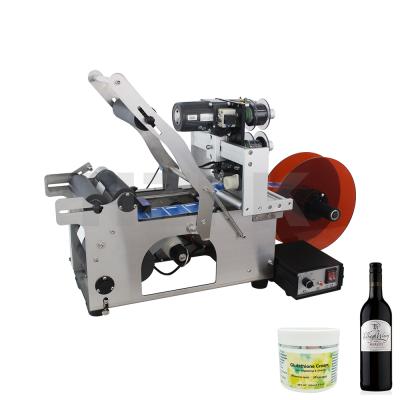 China HZPK mt-50 semi automatic food round wine pet bottle packaging label applicator glass printer machine for sale