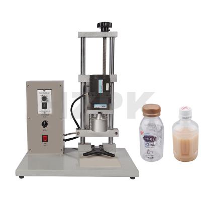 China DHZ-450A electric food capping machine is suitable for plastic capper like mineral bottle for sale