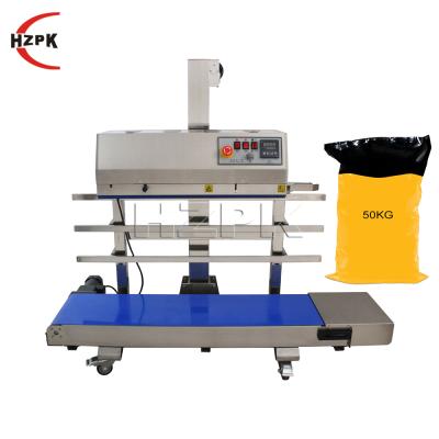 China HZPK Automatic Food Small Grain Aluminum Foil Bag Heat Sealer Plastic Sealing Machine for sale