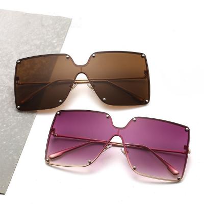 China Fashion Sunglasses 2202 Metal Integrated Rivet Rimless Sunglasses Fit Oversized Sunglasses for sale