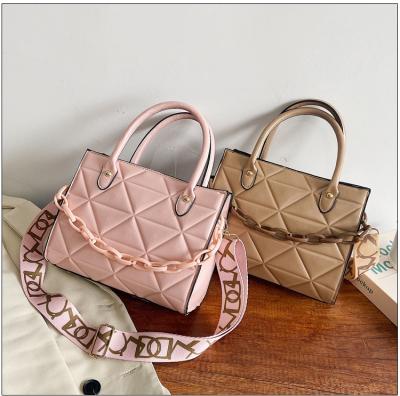 China 2021 factory wholesale high quality fashion women's handbag news single shoulder diagonal bag fashionable geometric embossed wide shoulder strap for sale