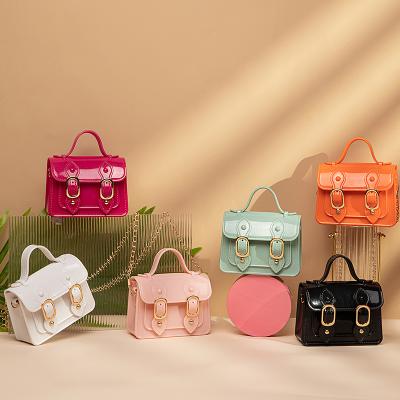 China Luxury Hot Sale PVC Jelly Handbag Toddler Kids Purses Luxury Cute Candy Colors Waterproof Fashion Mini Hand Bags For Little Girls for sale