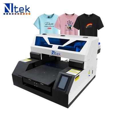 China Ntek Indoor Outdoor UV Flatbed Printer Mini Advertising Printing Machine Copy on T-shirt for sale