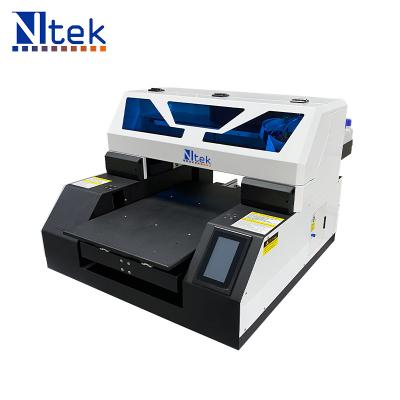 China Advertising A3 Indoor Outdoor UV Flatbed Printer MINI Printing Machine Ntek for sale