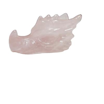 China Low MOQ China Wholesale Natural Crystal Dragon Skulls Hand Carved Rose Quartz Pink Dragon Head for sale