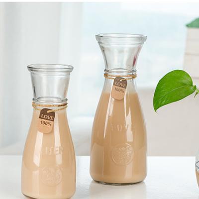 China Wholesale Beverage Vintage Drinking Glass Bottles For Juice Water Milk for sale