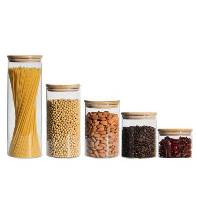 China Customized High Sustainable Borosilicate Glass Sealed Jar With Lid Wooden Jar Kitchen Storage Variety Grains Glass for sale