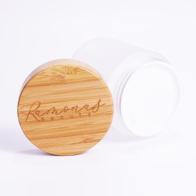 China 250g Biodegradable Customized Plastic Jar With Carving Logo Bamboo Cap Wholesale for sale