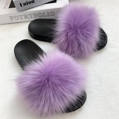 China New style soft and fluffy slippers girls fashion trend high quality faux fur slides fur slides for sale