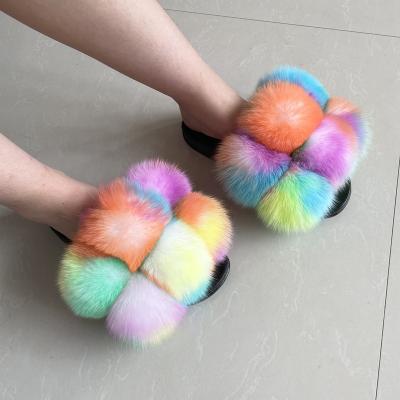 China 2020 Fashion Trend Big Ins Raccoon Fur Ball Outdoor Fur Slides Women's Cute Fluffy Pompom Real Fox Fur Slippers For Women for sale