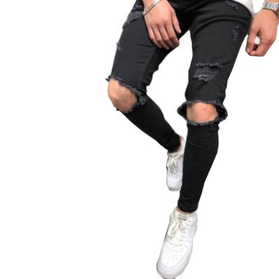 China Solid Color Breathable Mid Waist Ripped European Jeans Men And American Fashion Casual Tights for sale