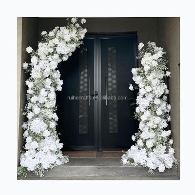 China Wedding stage decoration 2023 new wedding event decoration flower supplier horn-shape floral arch flower wedding arch decoration items for event for sale