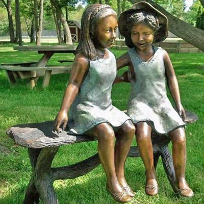 China Antique Europe Beautiful Handcrafted Garden Craft Bronze Sitting Reading Girl Statue for sale