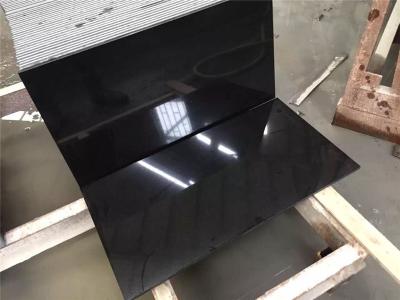 China Fractura afilada con piedra flameada losa natural negra del corte de máquina de las tejas del granito en venta