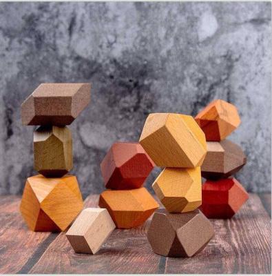 China Eco-friendly Wooden Colorful Stone Building Block Stacking Game Toy Block Construction Toys For Children Wooden Balancing Stones for sale