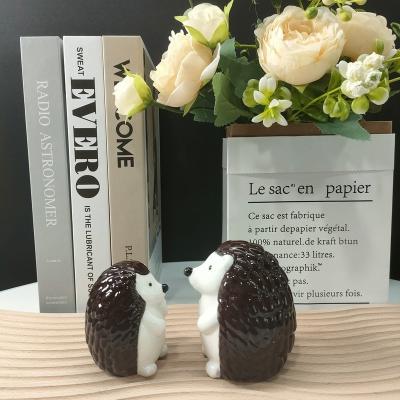 China Nordic Exquisite Hedgehog Indoor Ceramic Crafts Furnishings Unique Design Glossy Glazed Ceramic Matte Home Decoration Luxury for sale