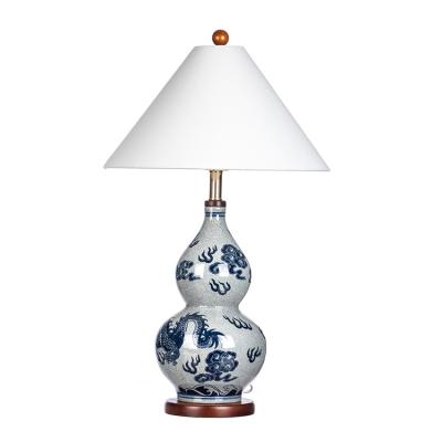 China Asian Custom Chinese Antique Decorative Blue And White Living Room Bed Bedroom Squash Shape Porcelain Ceramic Lamp for sale