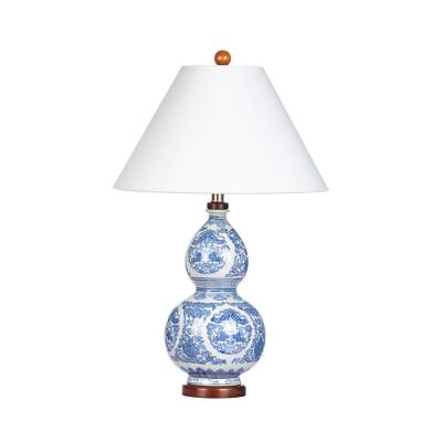 China New Asian Custom Chinese Antique Classical Blue And White Porcelain Squash Lamp Office Hotel Bedroom Desk Lamp for sale