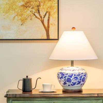 China Modern Decorative Light Blue Bedroom Decorative Ceramic Nightstand Hotel Reading Room Study Living Room Flower Sale Ceramic Table Lamp for sale