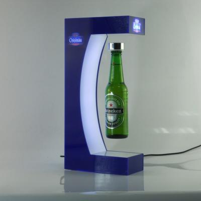 China Levitation and rotation in the air bottle creative new advertising ideas, led display stand levitating rotating bottle for sale