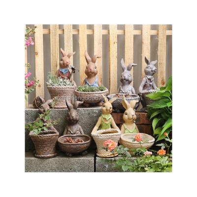 China Europe home ornament craft flower pots rabbit family sculpture statue resin animal figurines spring for sale